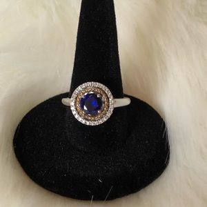Sterling silver ring with CZ sapphire stone.